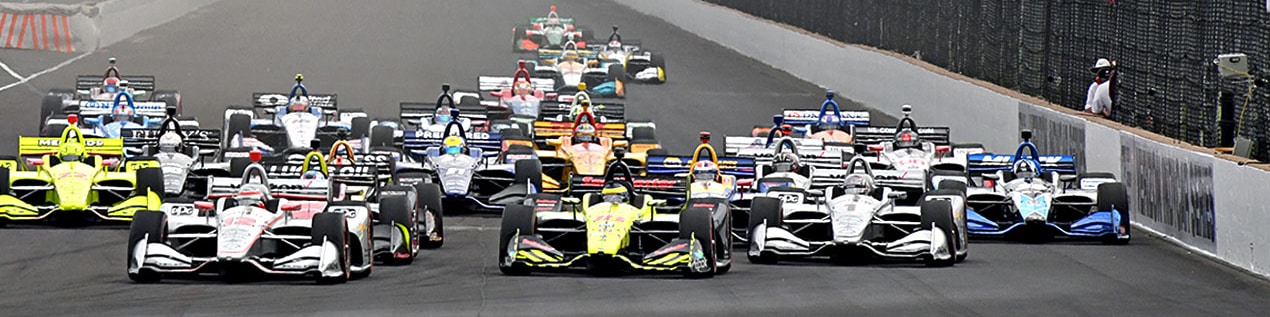indy cars racing to through the start line Riverside